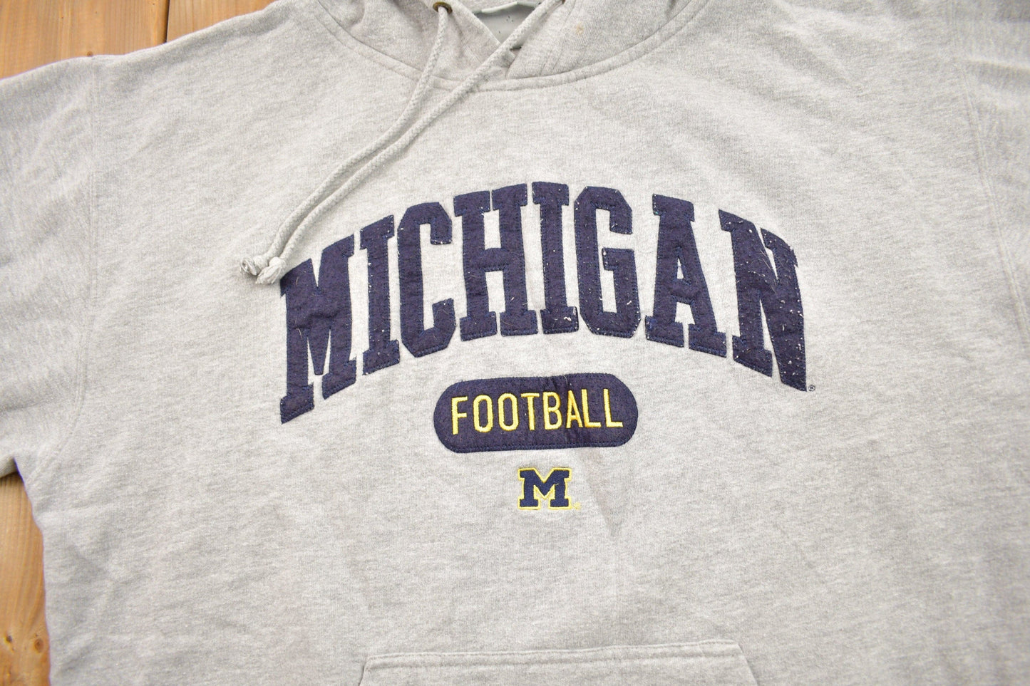 Vintage 1990s University of Michigan Wolverines NCAA Collegiate Hoodie Men's Large from propervintagecanada