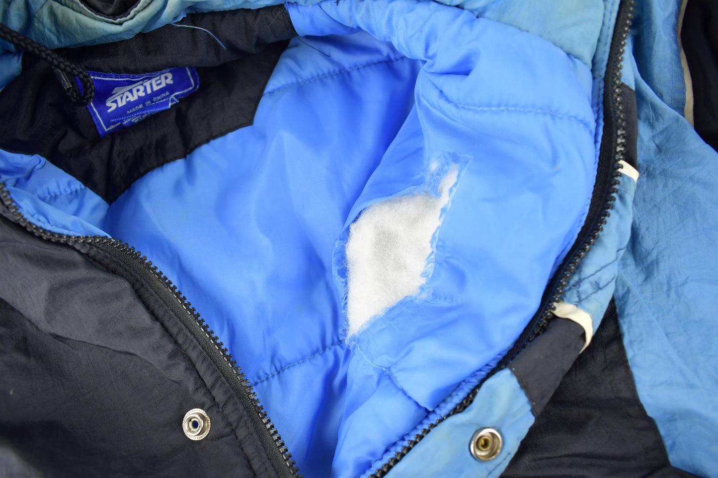 Vintage 1990s University of North Carolina Tar Heels Collegiate NCAA Quarter Zip Starter Jacket from propervintagecanada