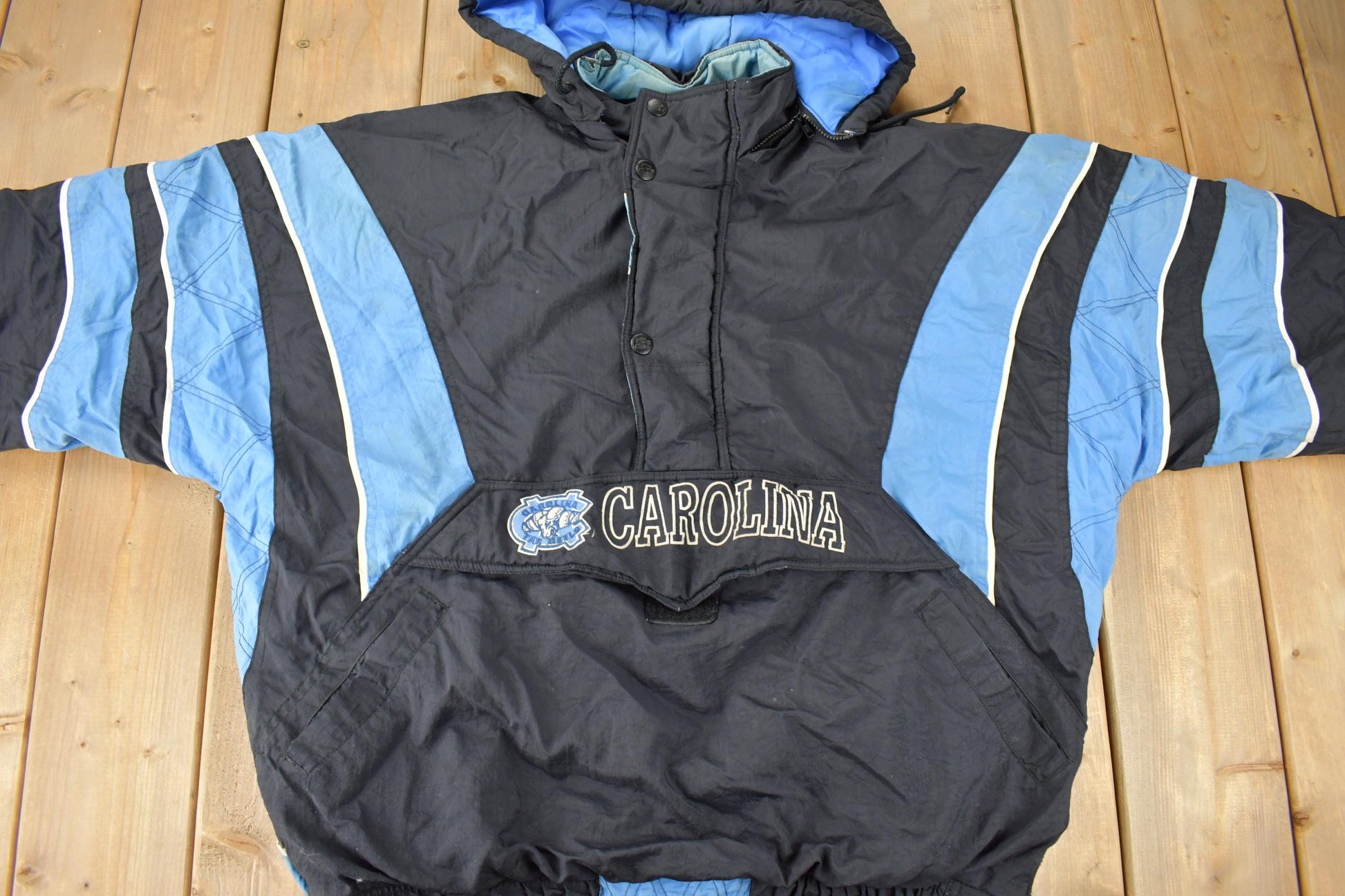 Vintage 1990s University of North Carolina Tar Heels Collegiate NCAA Quarter Zip Starter Jacket from propervintagecanada