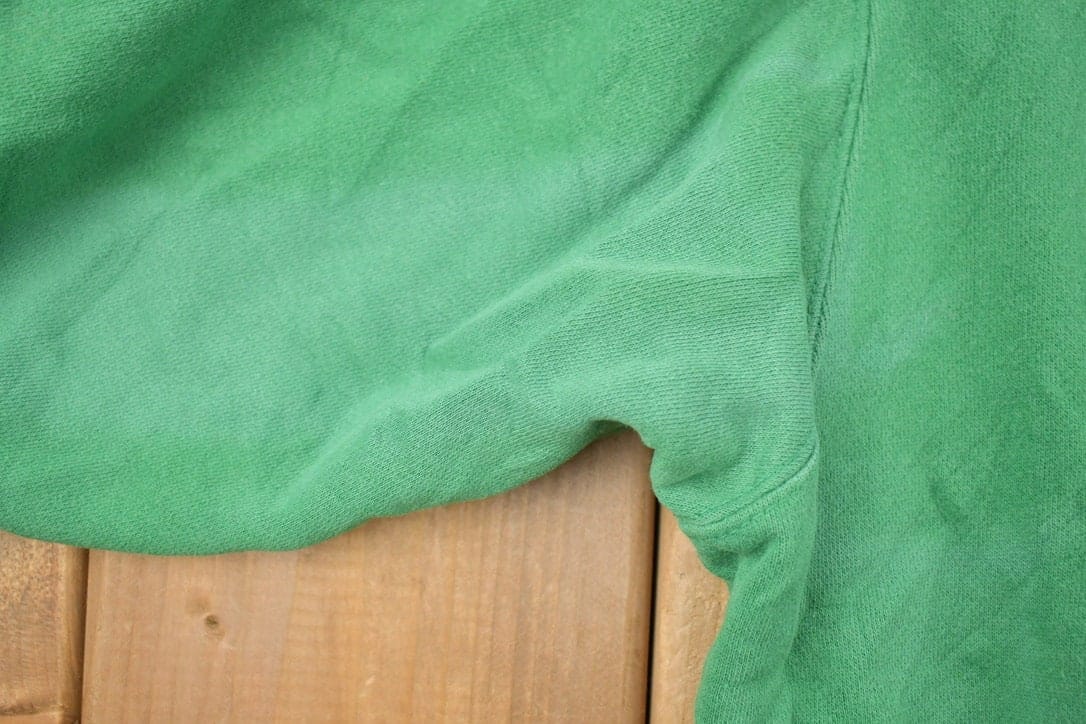Vintage 1990s University Of Notre Dame Collegiate Hoodie Men's 2XL from propervintagecanada
