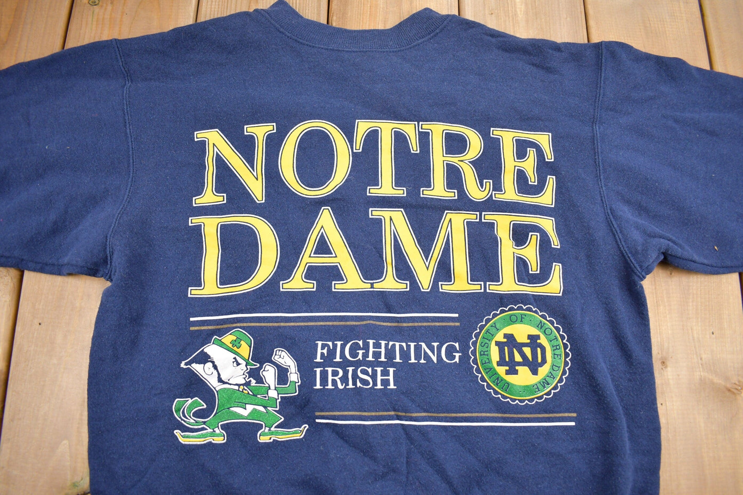 Vintage 1990s University Of Notre Dame Fighting Irish Collegiate Crewneck Men's S from propervintagecanada