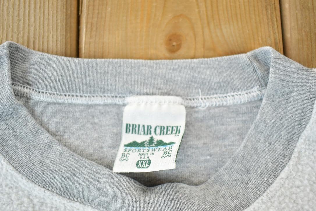 Vintage 1990s University Of Notre Dame Fighting Irish Embroidered Collegiate Crewneck Made In USA Men's XL from propervintagecanada