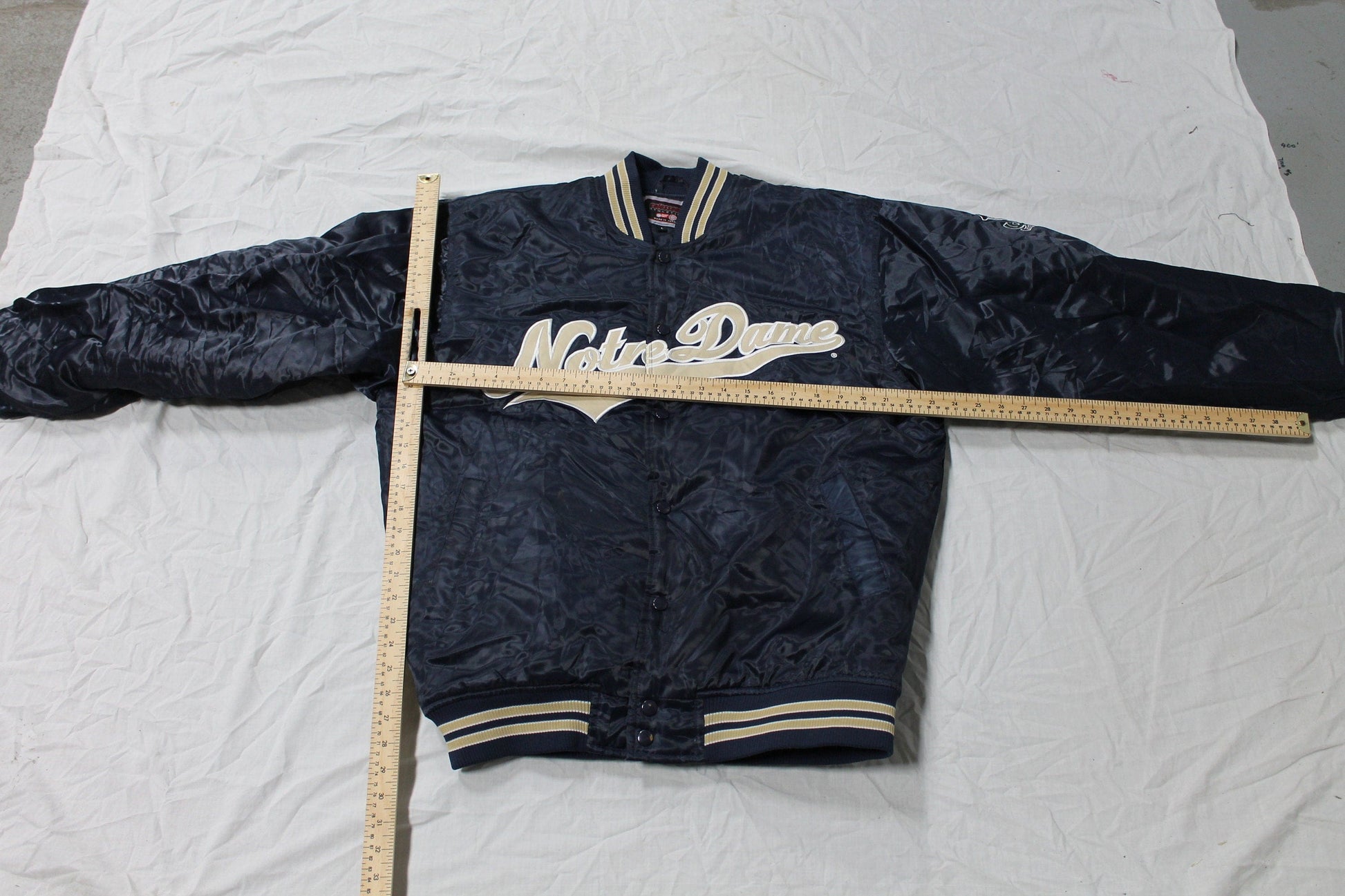 Vintage 1990s University Of Notre Dame Fighting Irish Varsity Bomber Jacket from propervintagecanada