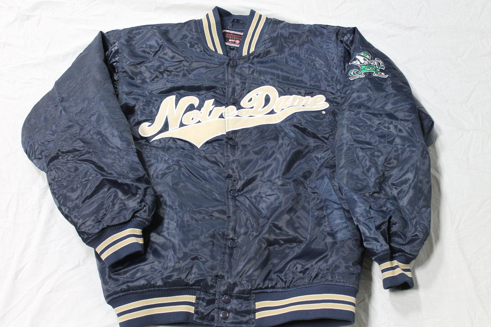Vintage 1990s University Of Notre Dame Fighting Irish Varsity Bomber Jacket from propervintagecanada
