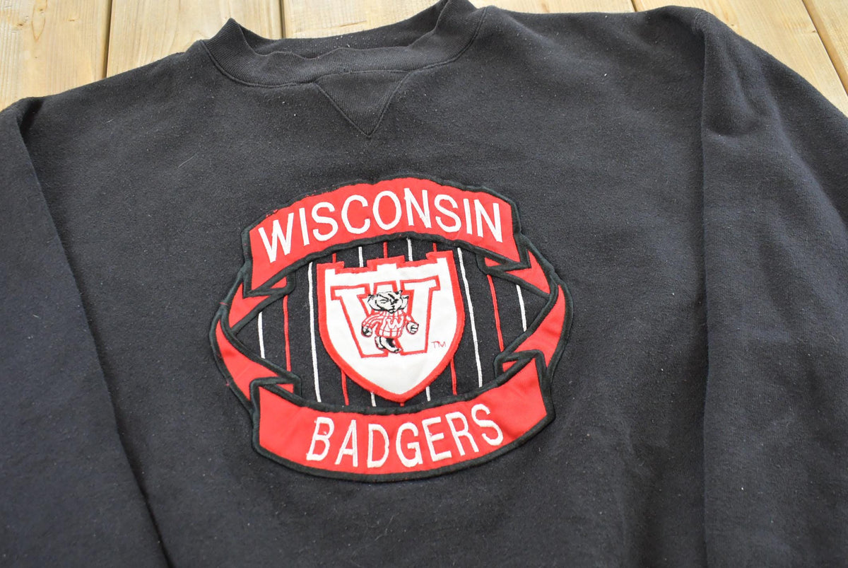 Vintage 1990s University of Wisconsin Badgers Pullover Crewneck Sweatshirt Men's M from propervintagecanada