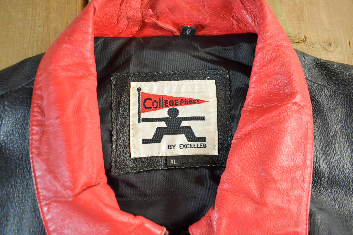 Vintage 1990s University Of Wisconsin Leather Varsity Jacket Men's XL from propervintagecanada