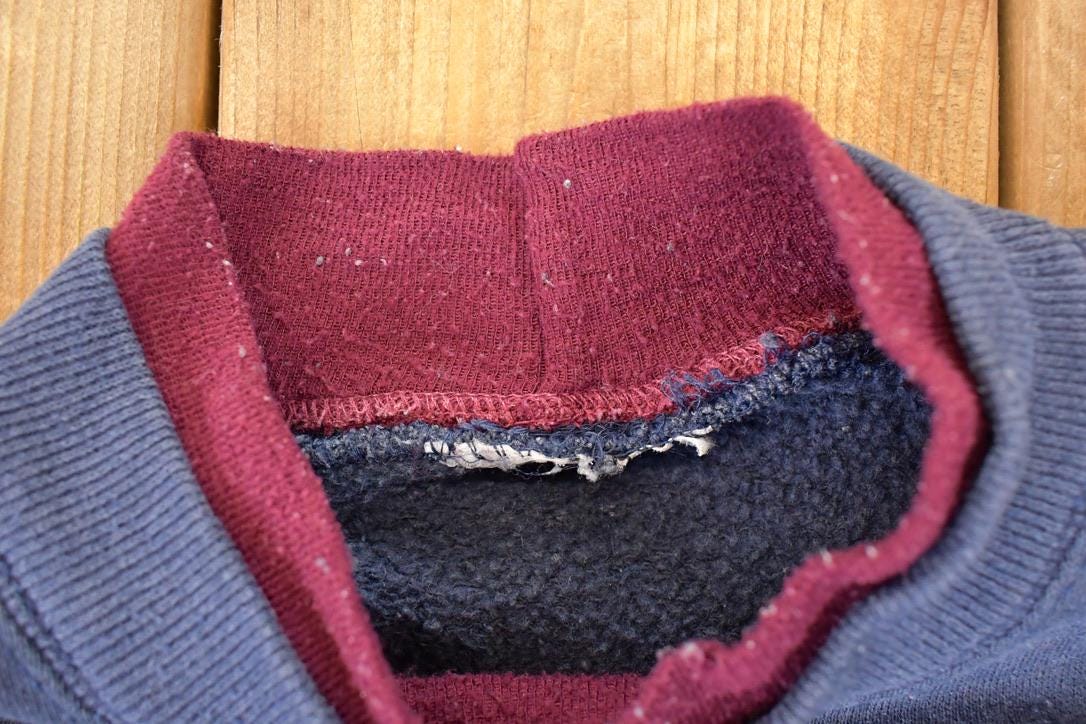 Vintage 1990s Up North Minnesota Embroidered Wolfpack Double Collar Crewneck Sweatshirt Mens L from propervintagecanada