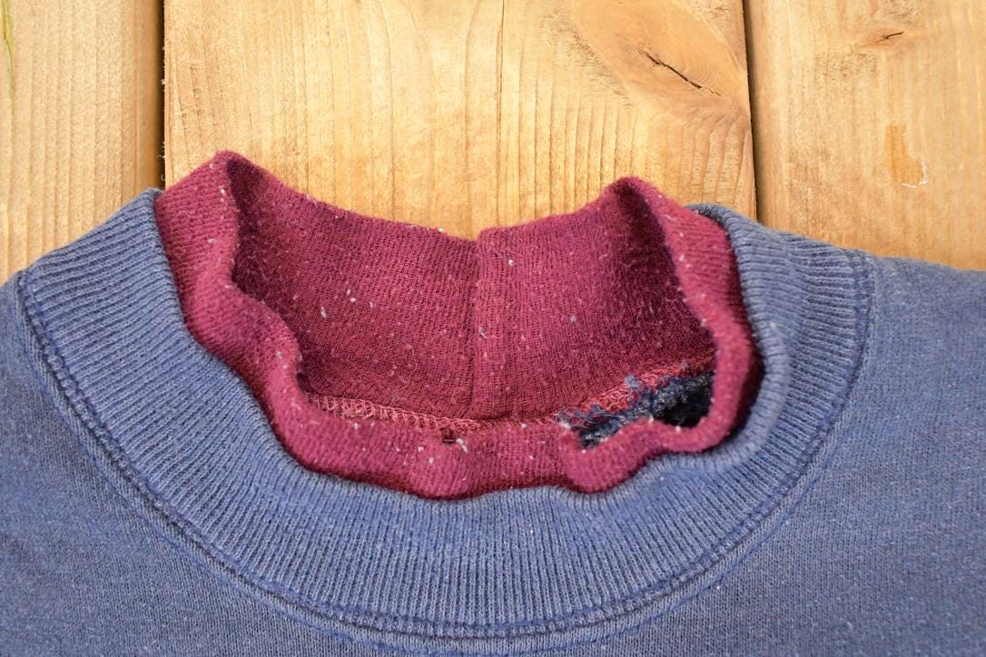 Vintage 1990s Up North Minnesota Embroidered Wolfpack Double Collar Crewneck Sweatshirt Mens L from propervintagecanada