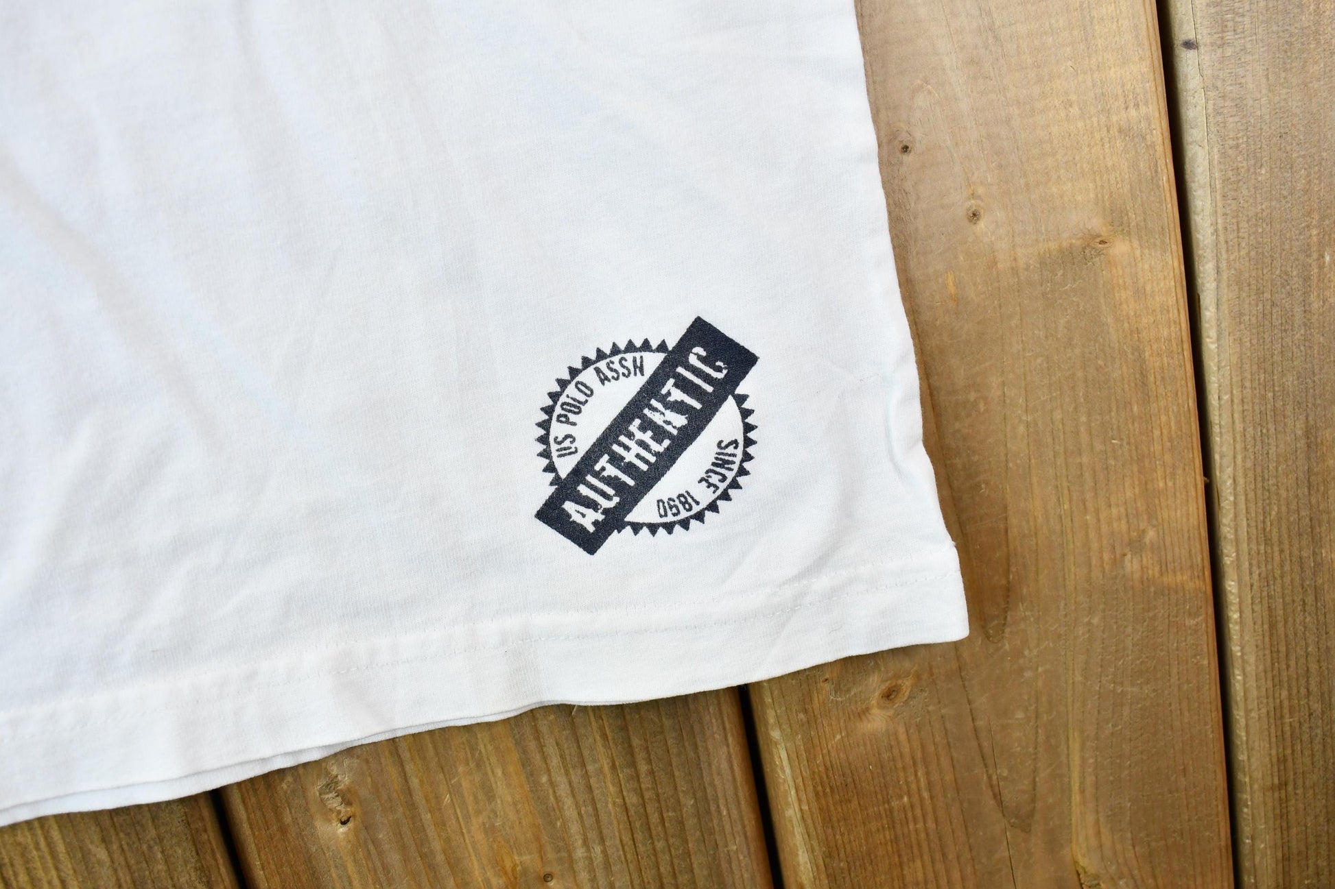 Vintage 1990s US Polo Association Athletic Single Stitch Graphic Ringer T-Shirt Men's XL from propervintagecanada