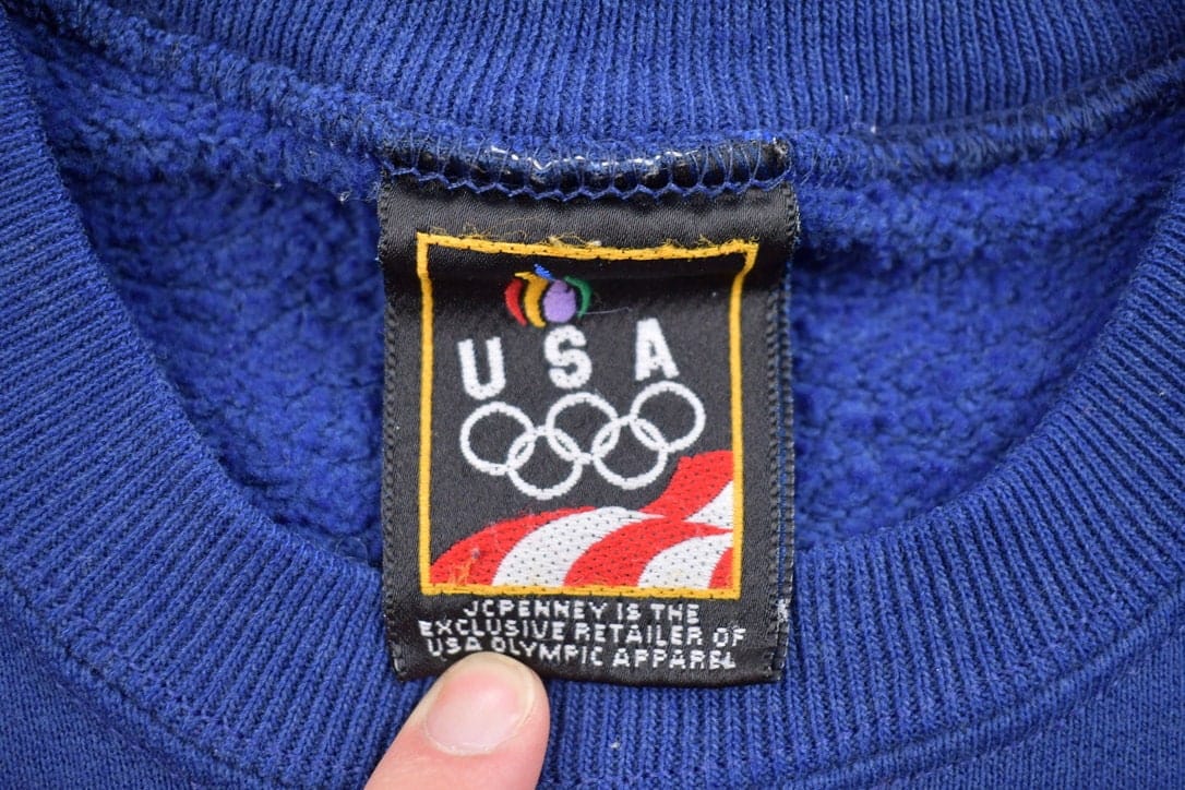 Vintage 1990s USA Olympic Blank Navy Blue Crewneck Sweatshirt from propervintagecanada