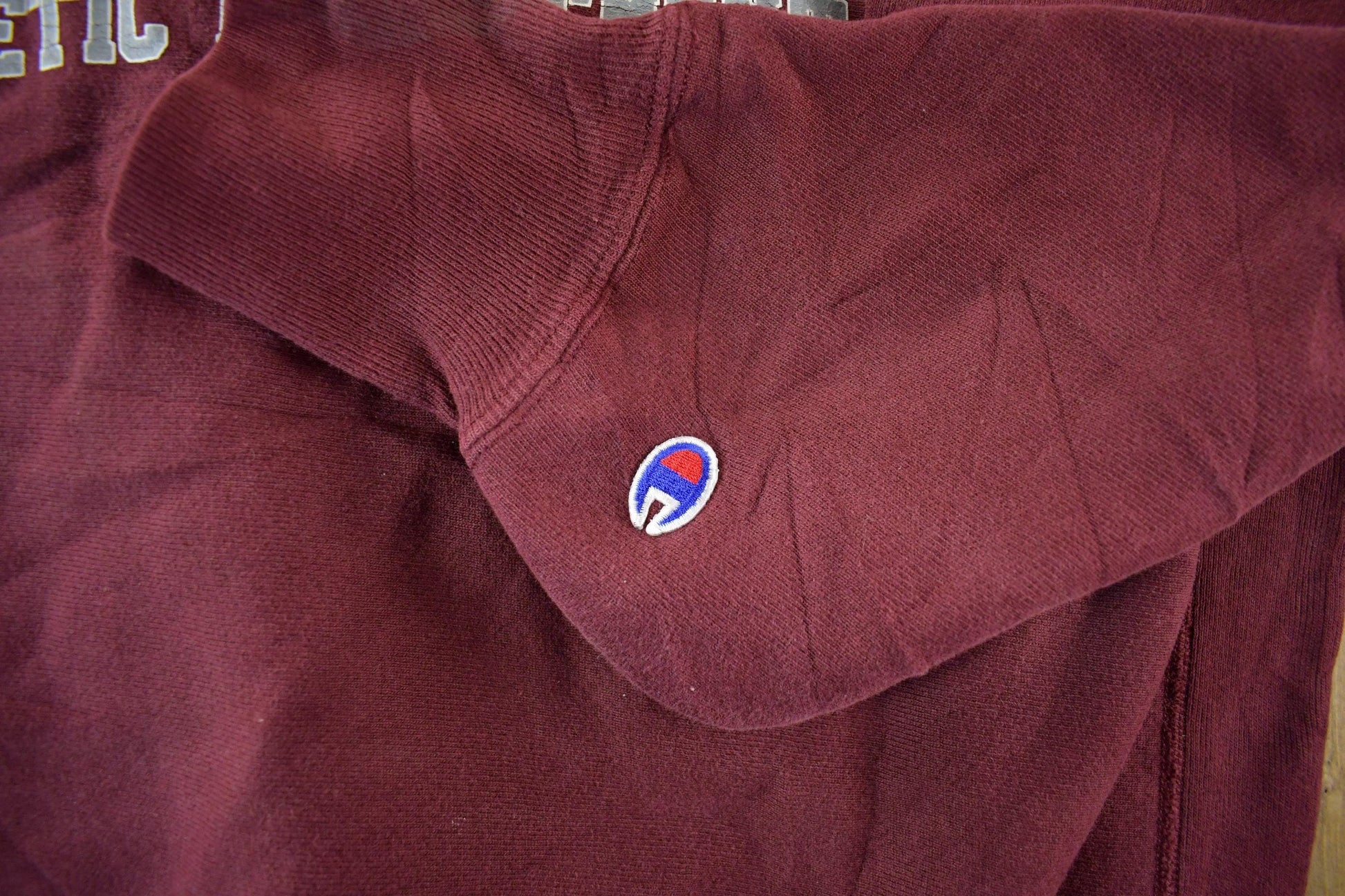 Vintage 1990s UW LA Crosse Champion Reverse Weave Crewneck Sweatshirt Men's XL from propervintagecanada