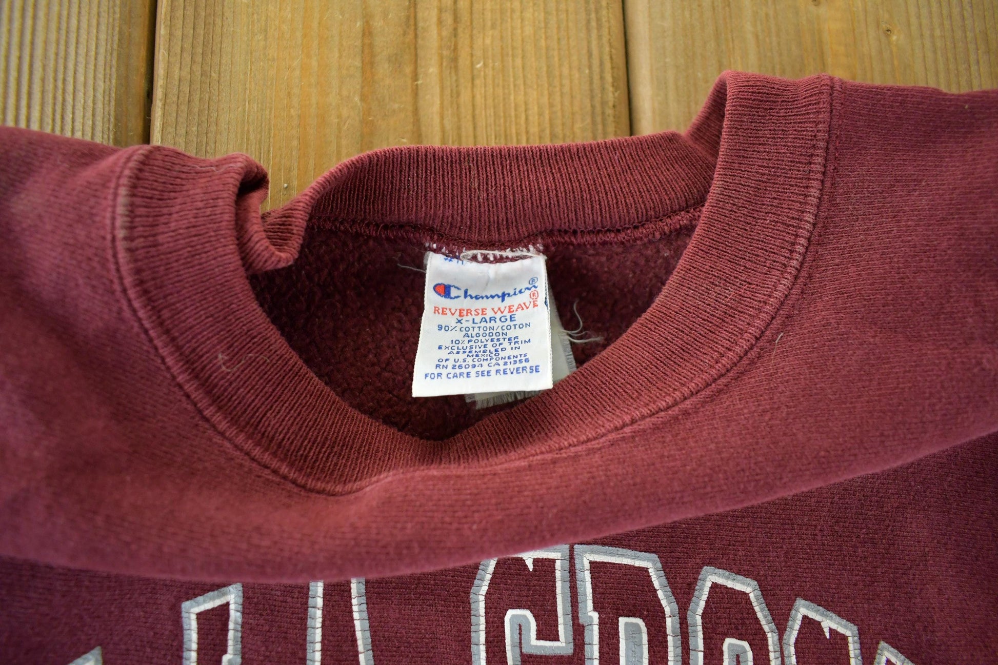 Vintage 1990s UW LA Crosse Champion Reverse Weave Crewneck Sweatshirt Men's XL from propervintagecanada