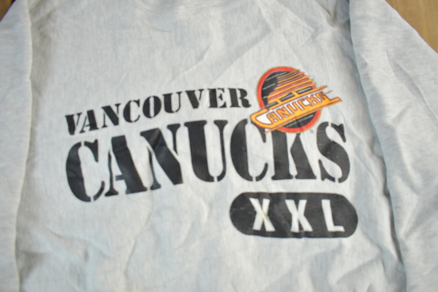 Vintage 1990s Vancouver Canucks NHL Champion Reverse Weave Crewneck Sweatshirt Men's XL from propervintagecanada
