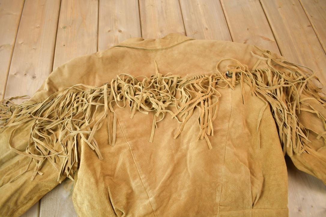 Vintage 1990s Very Trendy Brown Suede Leather Fringe Jacket Women's L from propervintagecanada