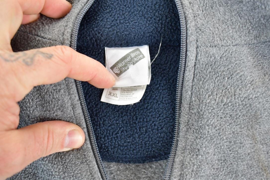 Vintage 1990s Warner Brothers Fleece Taz Embroidered Outdoorsman Sweater Men's 2XL from propervintagecanada