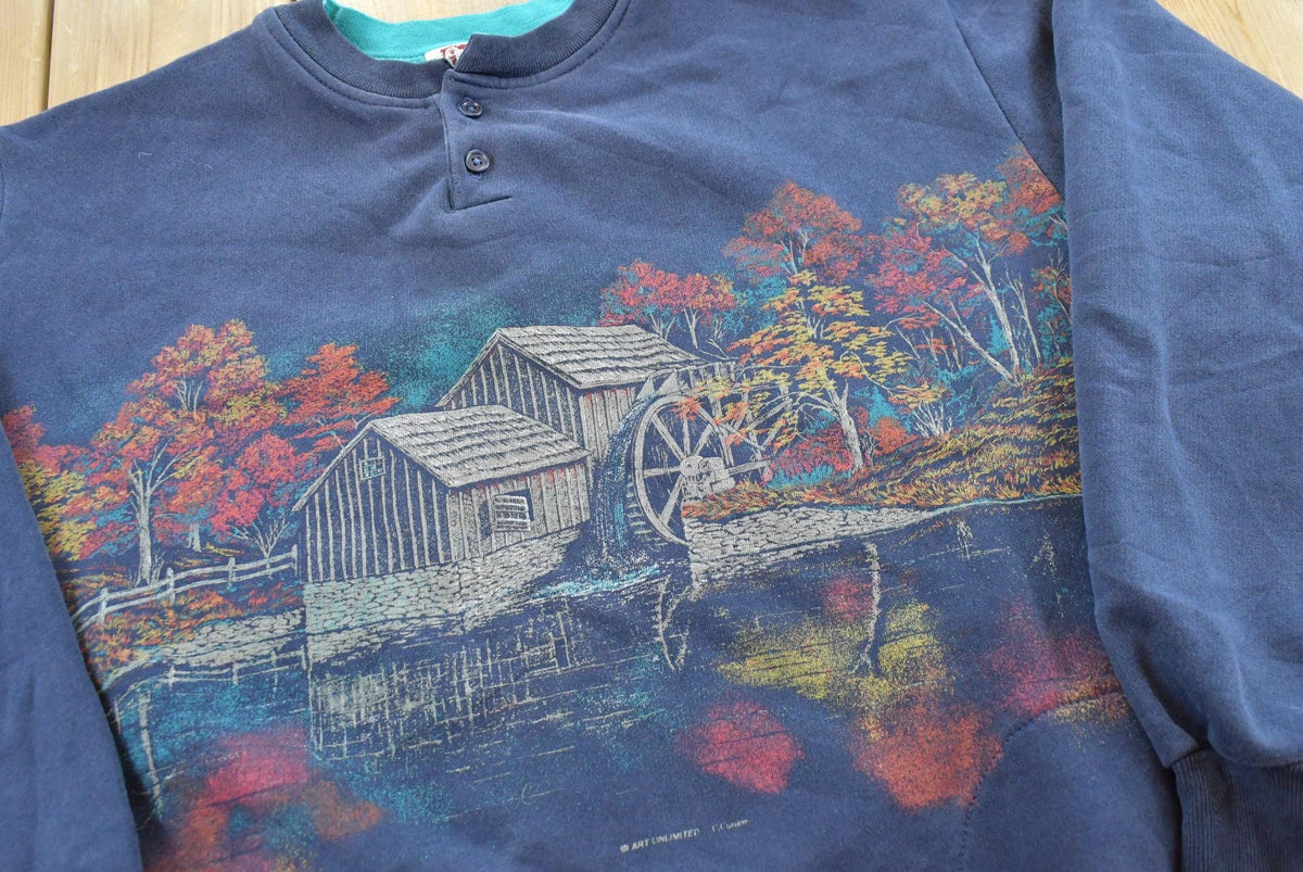 Vintage 1990s Water Wheel Forest All Over Print Quarter Button Sweater Men's XL from propervintagecanada