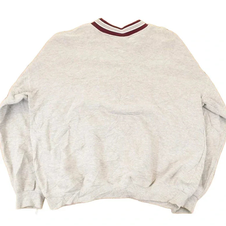 Vintage 1990s Wilmot Wolves Embroidered Collegiate V Neck Sweatshirt Men's XL from propervintagecanada