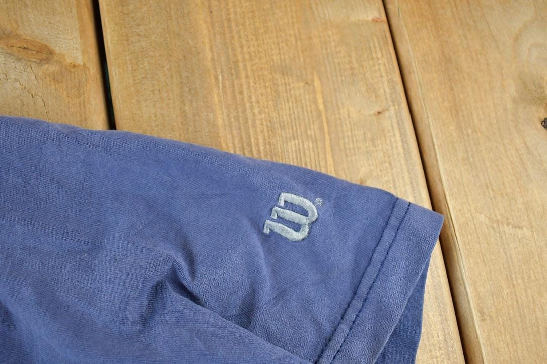 Vintage 1990s Wilson Souvenir Single Stitch Graphic Print T-Shirt Men's 2XL from propervintagecanada