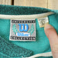 Vintage 1990s Wilson University Embroidered Henley Collar Sweatshirt Men's L from propervintagecanada