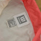 Vintage 1990s Wilson Women's Pink Windbreaker Jacket Women's L from propervintagecanada
