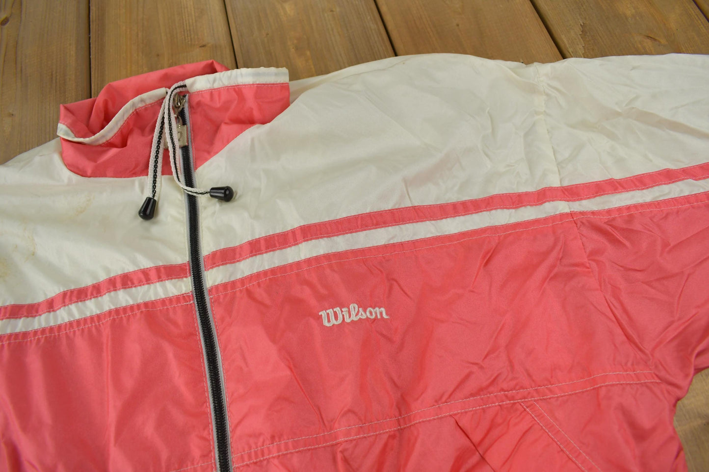 Vintage 1990s Wilson Women's Pink Windbreaker Jacket Women's L from propervintagecanada