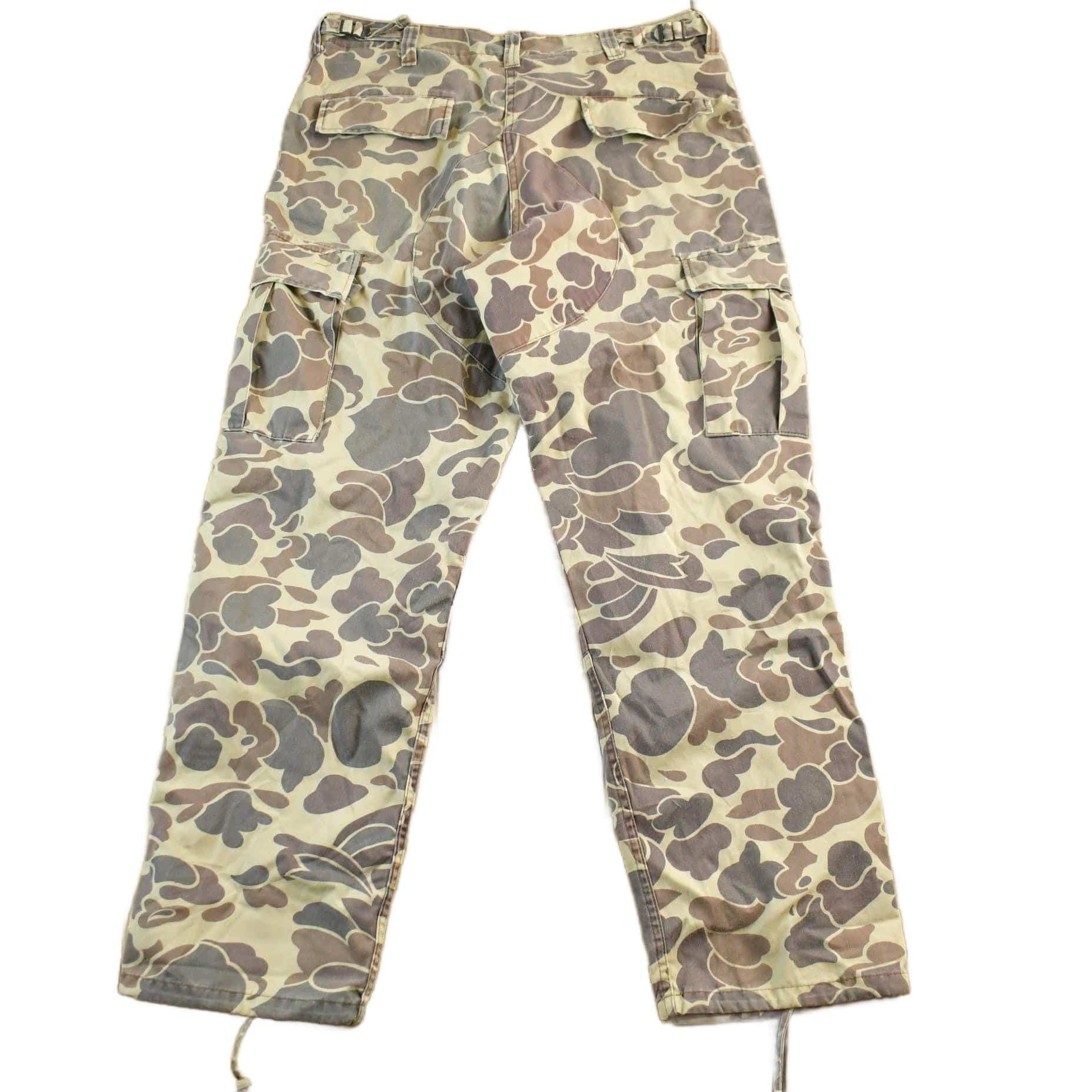 Vintage 1990s Winchester Camo Hunting Pants Men's 35 x 30 from propervintagecanada