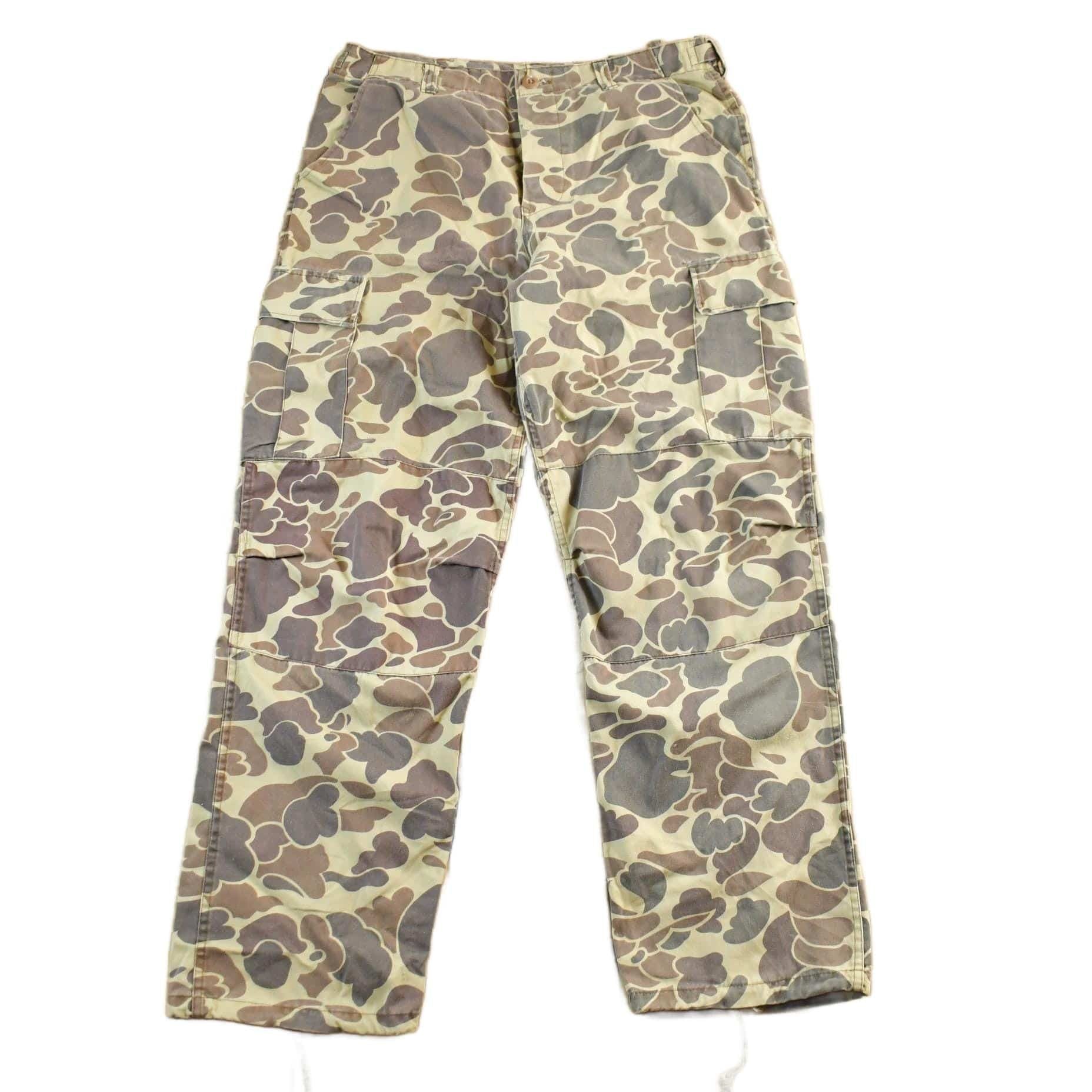 Vintage 1990s Winchester Camo Hunting Pants Men's 35 x 30 from propervintagecanada
