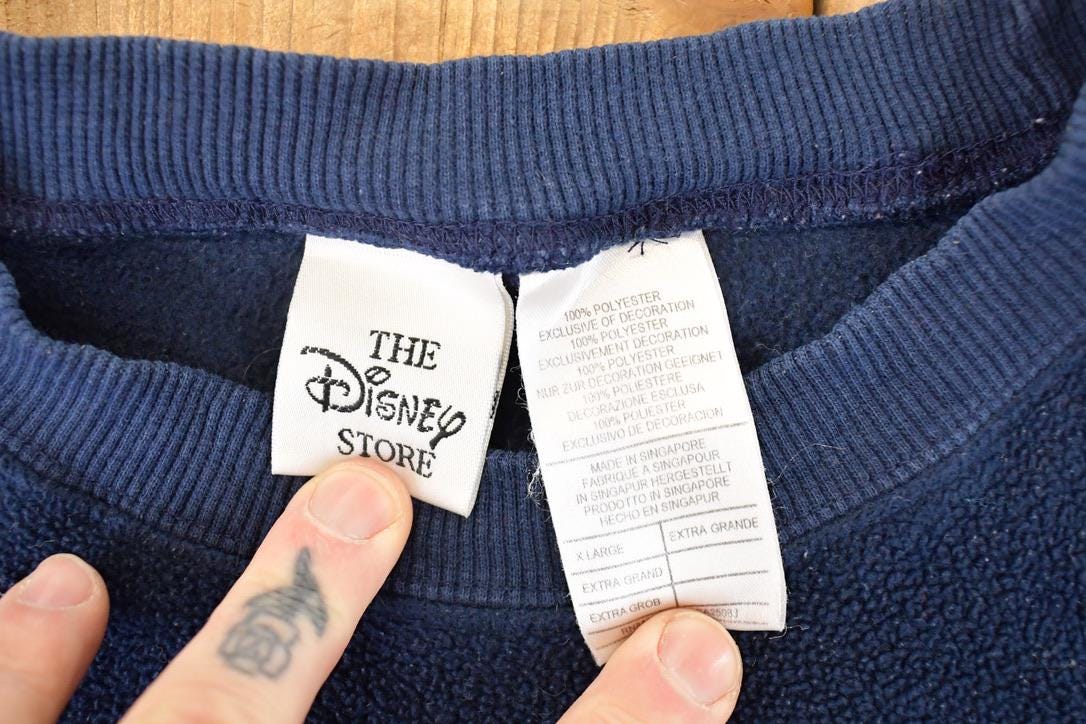 Vintage 1990s Winnie The Pooh And Friends Embroidered Fleece Disney Crewneck Sweater Men's XL from propervintagecanada