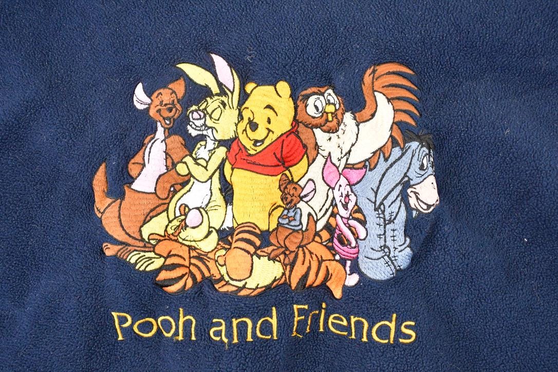 Vintage 1990s Winnie The Pooh And Friends Embroidered Fleece Disney Crewneck Sweater Men's XL from propervintagecanada