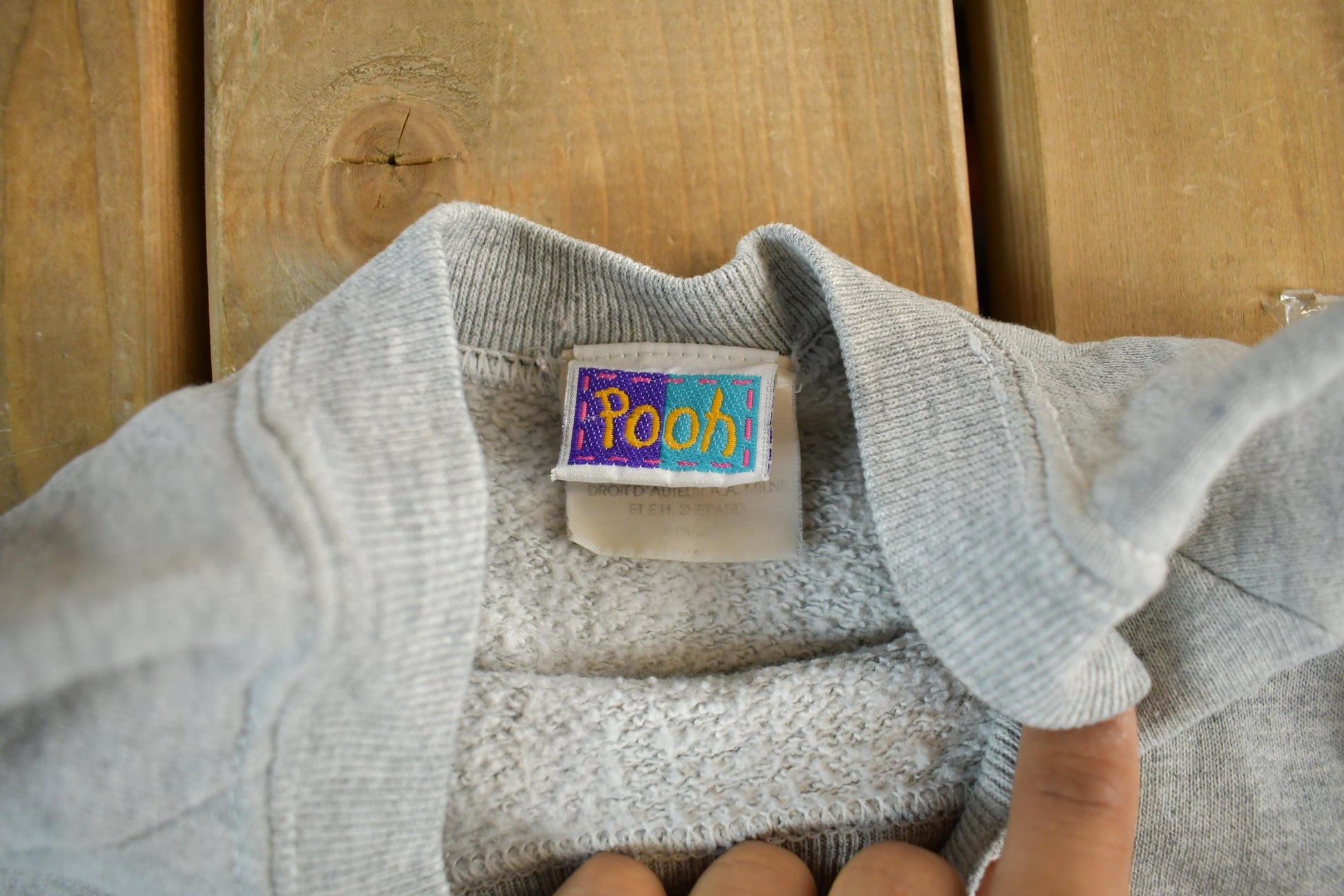 Vintage 1990s Winnie The Pooh Disney Winter Crewneck Youth M-L from propervintagecanada