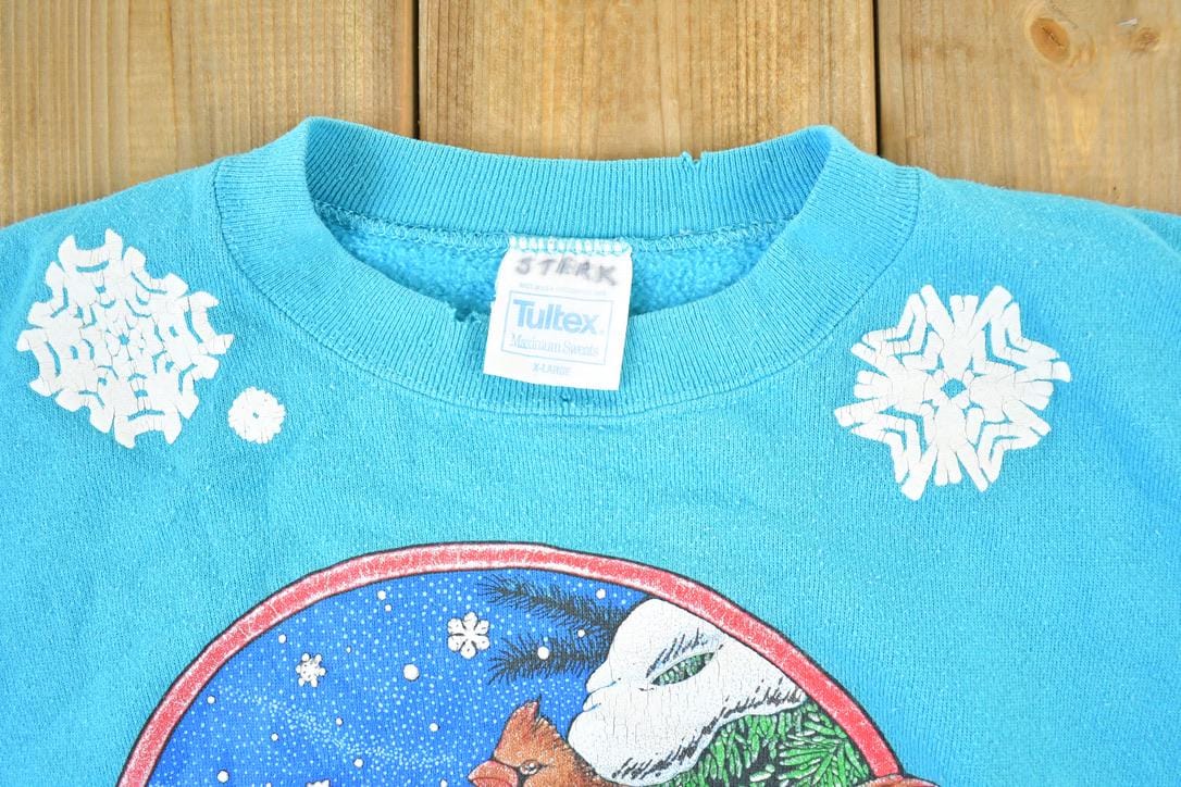 Vintage 1990s Winter Cardinal AOP Crewneck Sweatshirt Mens XL from propervintagecanada