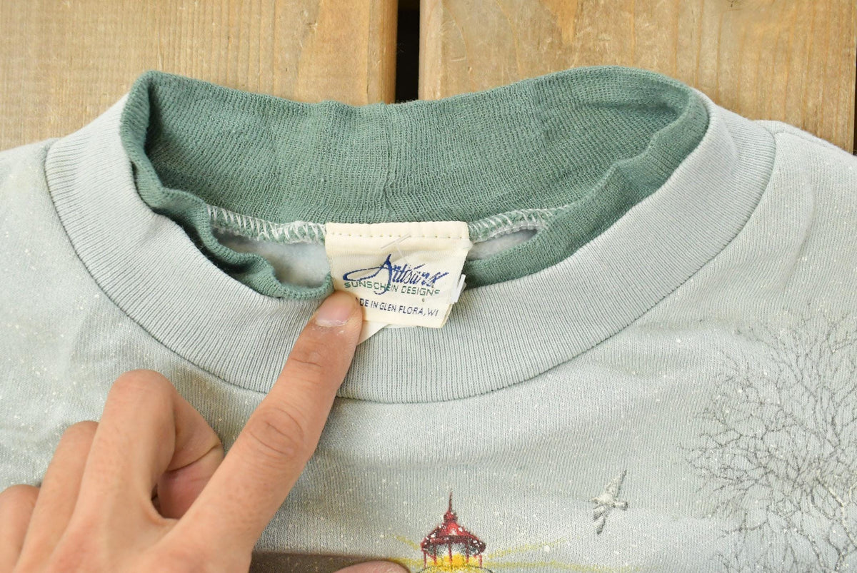 Vintage 1990s Winter Lighthouse All Over Print Crewneck Sweatshirt Men's Large from propervintagecanada