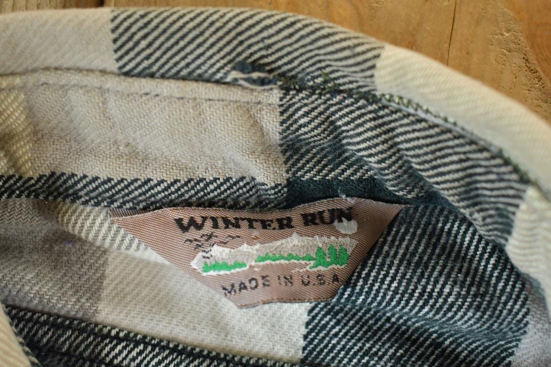 Vintage 1990s Winter Run Plaid Flannel Button Up Shirt Mens XL from propervintagecanada