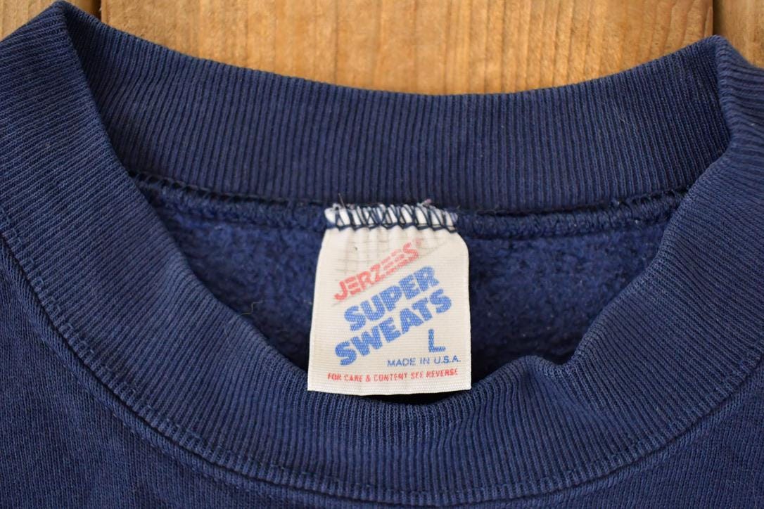 Vintage 1990s Wisconsin Dells Embroidered Sun Crewneck Sweatshirt Men's L from propervintagecanada