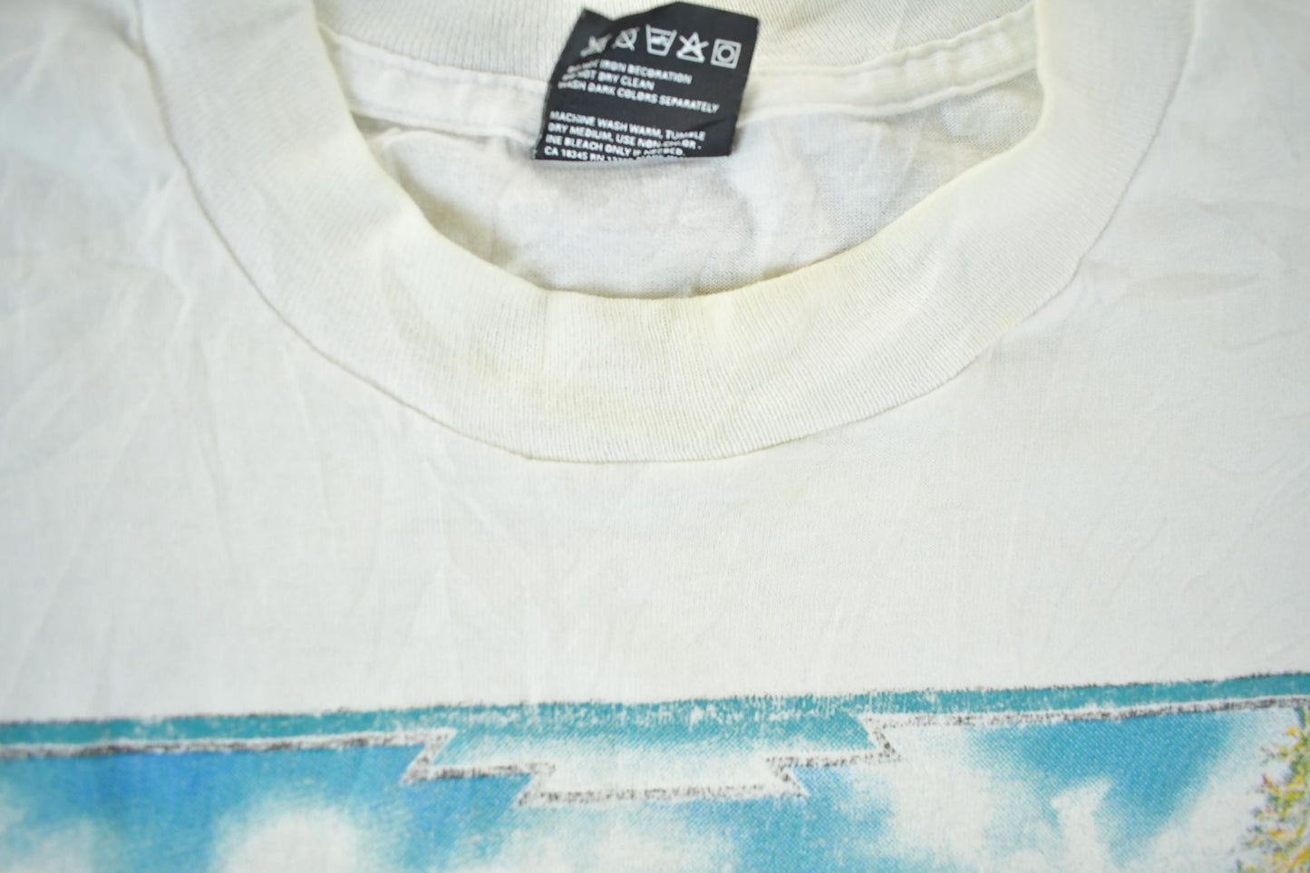 Vintage 1990s Wolf Graphic T Shirt Men's XL from propervintagecanada