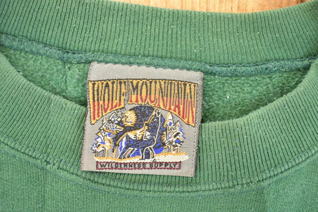 Vintage 1990s Wolf Mountain Sportsman's Classic Embroidered Crewneck Sweatshirt Men's L from propervintagecanada