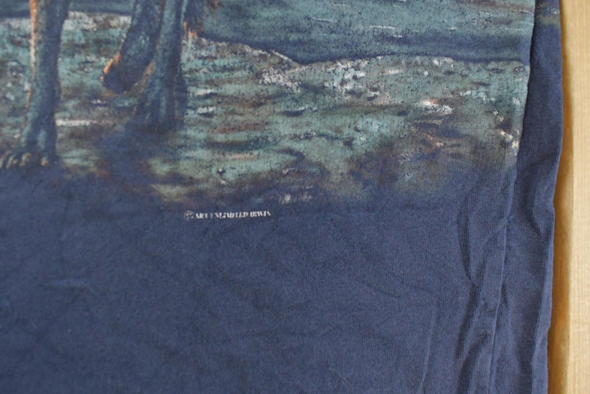 Vintage 1990s Wolf Theme All Over Print Graphic T-Shirt Men's XL from propervintagecanada