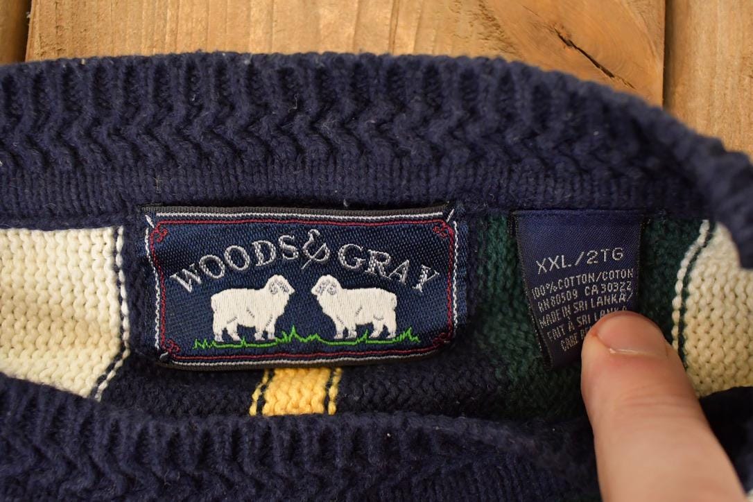 Vintage 1990s Woods And Gray Plaid Knit Crewneck Sweater Men's XL from propervintagecanada
