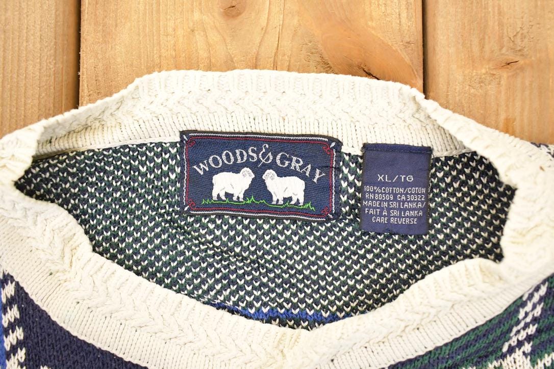 Vintage 1990s Woods And Gray Plaid Knit Crewneck Sweater Men's XL from propervintagecanada