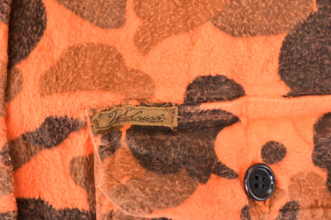 Vintage 1990s Woolrich Orange Camo Button Up Flannel Shirt Men's L from propervintagecanada