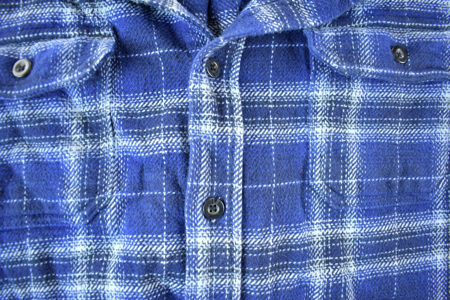 Vintage 1990s Woolrich Plaid Flannel Button Up Shirt Men's 2XL from propervintagecanada