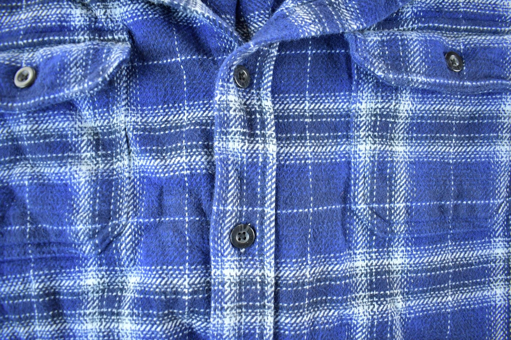 Vintage 1990s Woolrich Plaid Flannel Button Up Shirt Men's 2XL from propervintagecanada