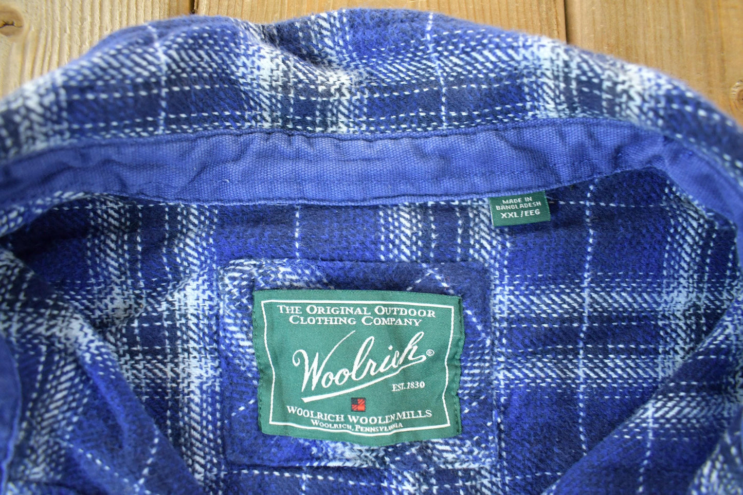 Vintage 1990s Woolrich Plaid Flannel Button Up Shirt Men's 2XL from propervintagecanada