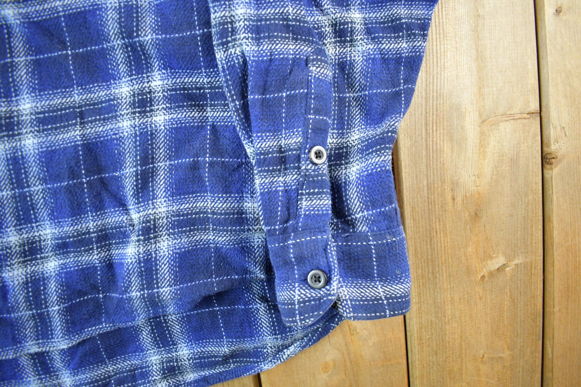 Vintage 1990s Woolrich Plaid Flannel Button Up Shirt Men's 2XL from propervintagecanada