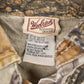 Vintage 1990s Woolrich Real Tree Camo Button Up Shirt Men's XL from propervintagecanada