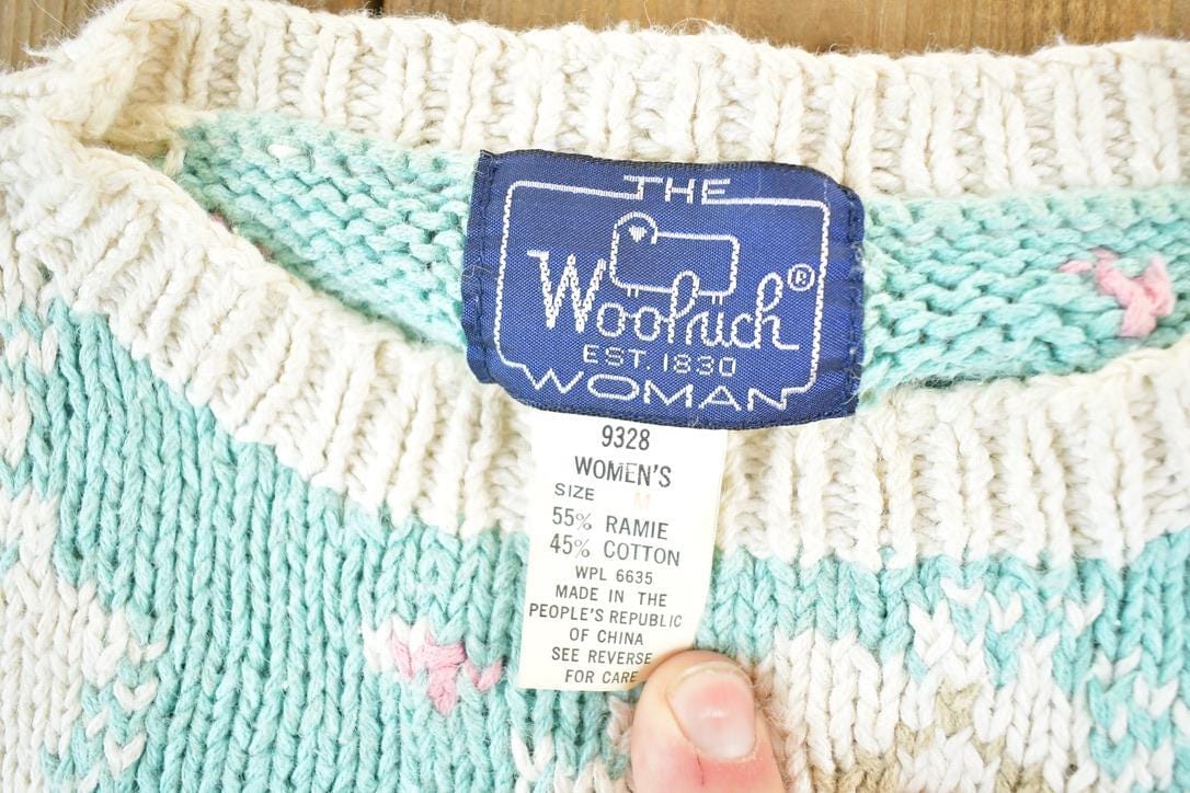 Vintage 1990s Woolrich Woman Knit Porch Swing Crewneck Sweater Womens S from propervintagecanada