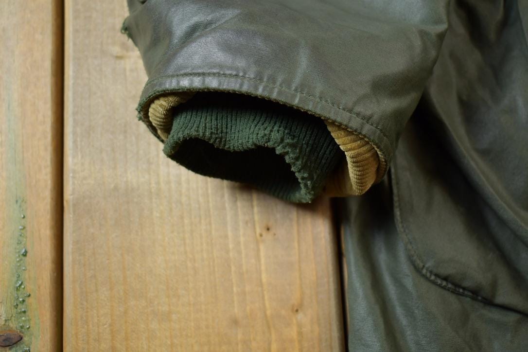Vintage 1990s Woolrich Wool Lined Nylon Jacket Made In USA Men's XL from propervintagecanada