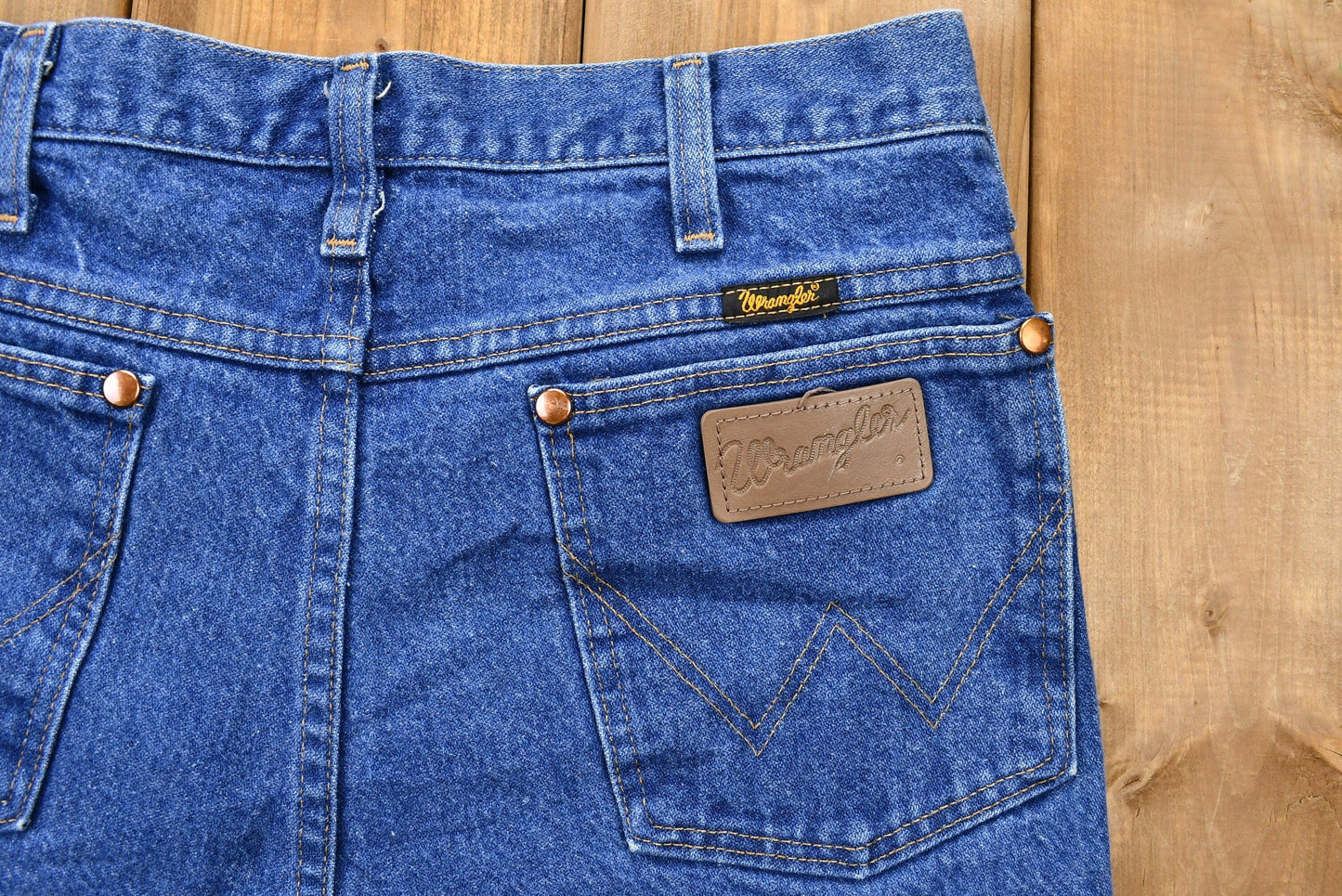 Vintage 1990s Wrangler Mid-Wash Bootcut Denim Jeans Men's 30 from propervintagecanada