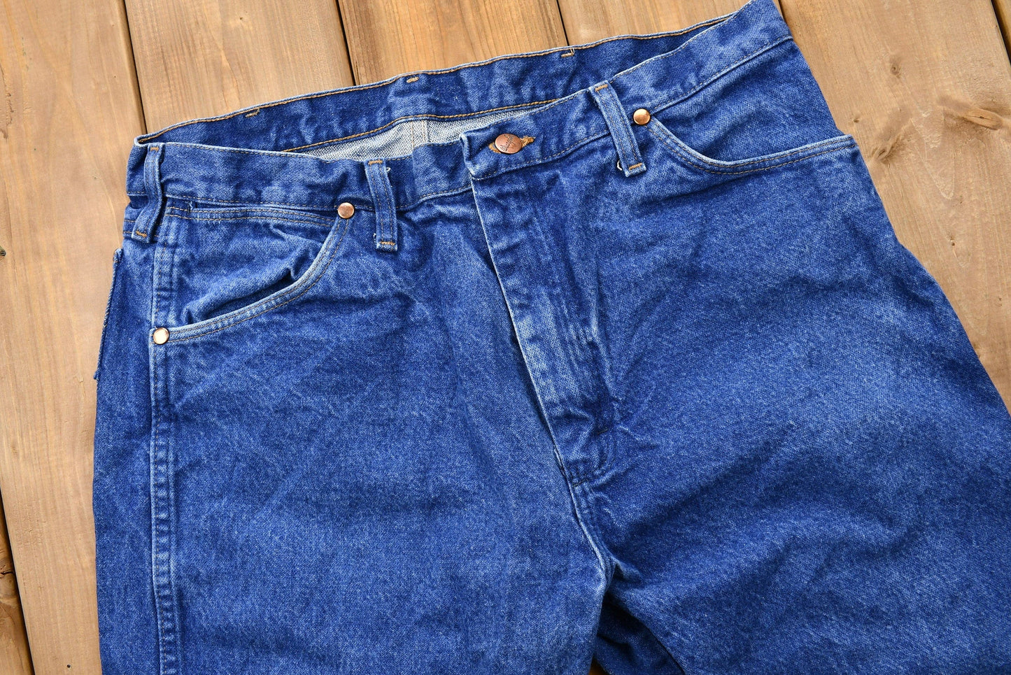 Vintage 1990s Wrangler Mid-Wash Bootcut Denim Jeans Men's 34 from propervintagecanada
