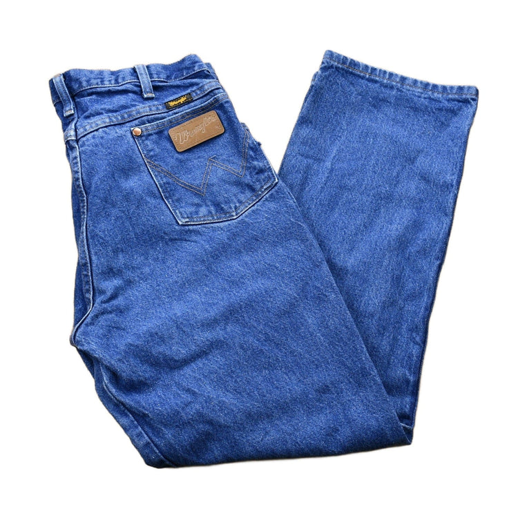 Vintage 1990s Wrangler Mid-Wash Bootcut Denim Jeans Men's 34 from propervintagecanada